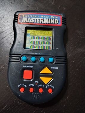 Hasbro Mastermind Handheld Game - Black with Blue, Red & Yellow Buttons